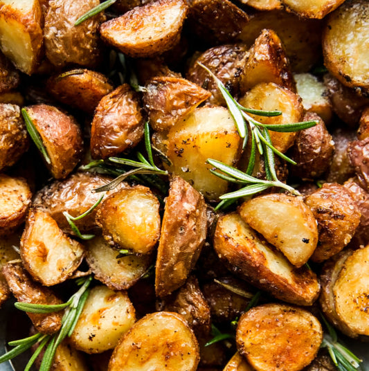 Roasted baby potatoes and rosemary in silan (per 1 lb)